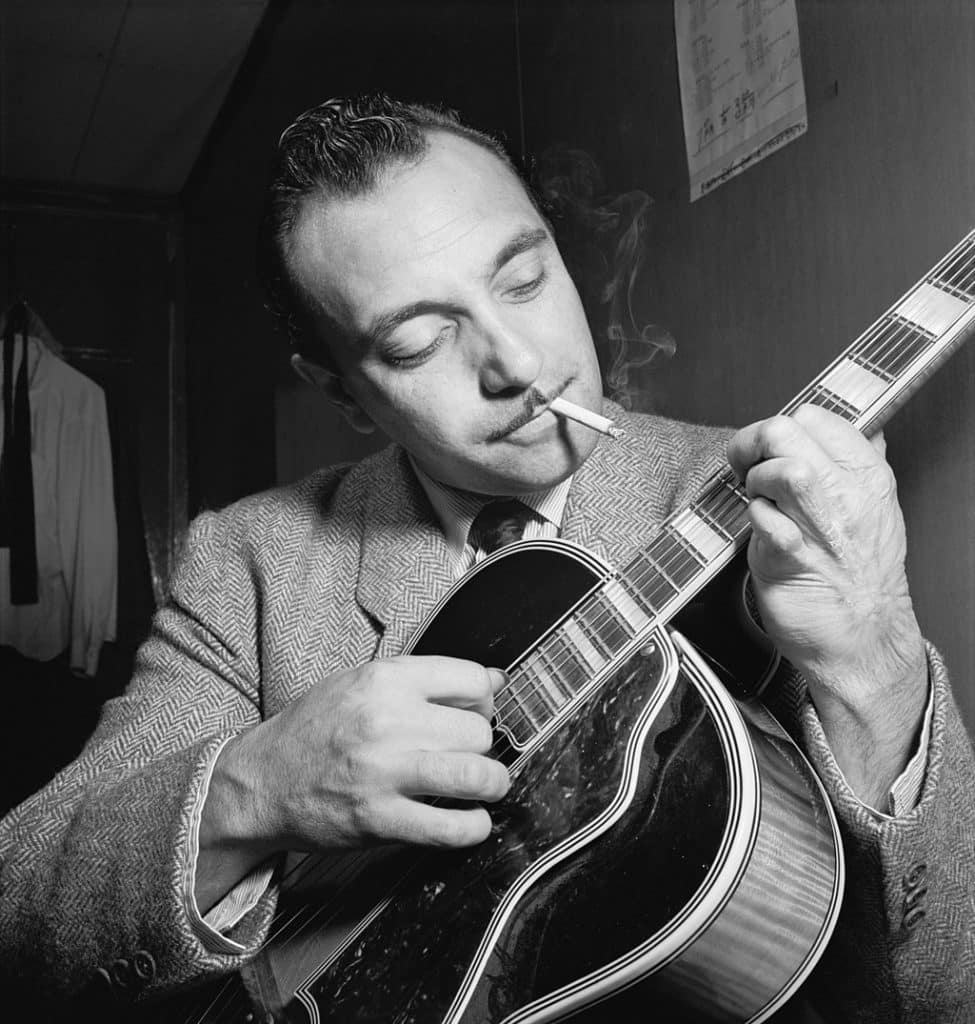 Gypsy jazz guitarist Django Reinhardt at the Aquarium jazz club in New York, NY