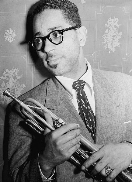 Jazz musician Dizzy Gillespie holding his trumpet